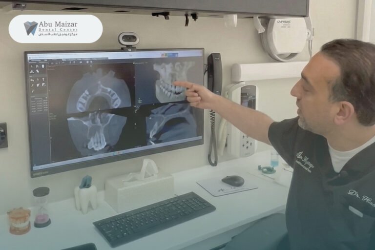 Dr. Hasan explaining dental CBCT scan results to a patient during consultation