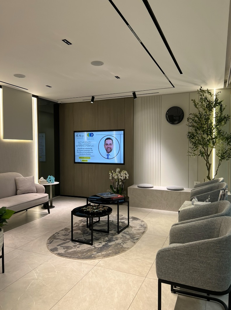 Premium dental clinic with specialist using advanced microscope technology